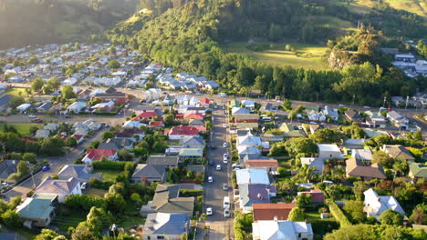 aerial view of a residential neighborhood with houses and cars