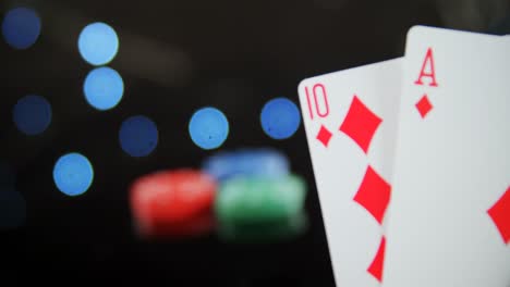 Stack-of-playing-cards-on-poker-table-4k