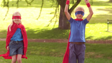 children pretending to be superhero