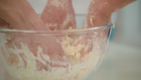 mother with child cooking dough. mother with daughter cooking pastry