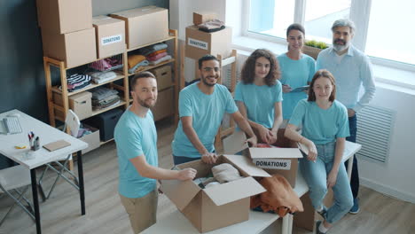 volunteers sorting donations at a charity organization