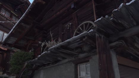 snowy swiss chalet in the mountains