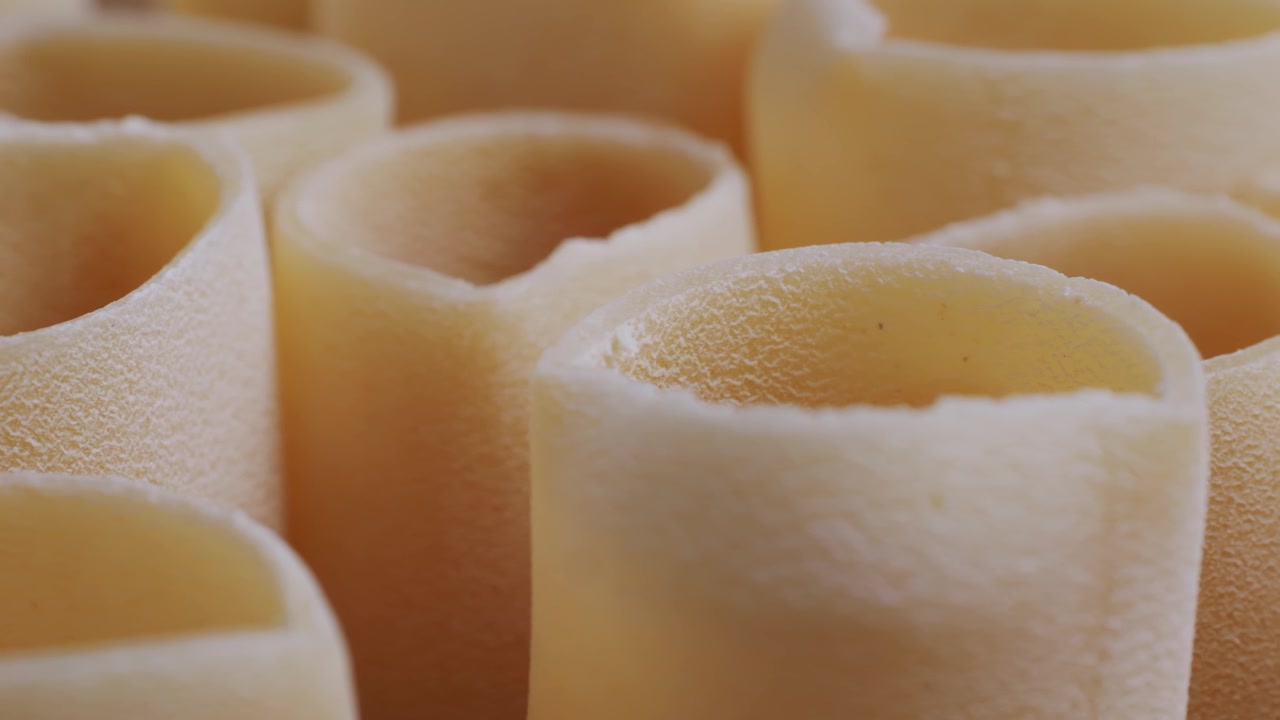 Close-up Macro Shot of Uncooked Tubular Pasta