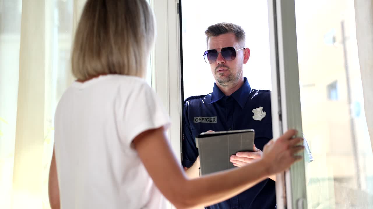 Police Officer at Doorway
