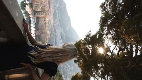 cinematic vertical footage of beautiful woman tourist in monaco at sunset