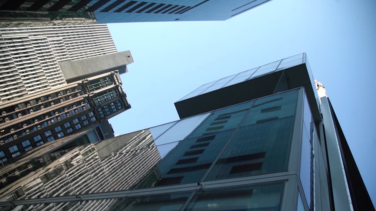 New York City crystal building in slow motion with blue sky