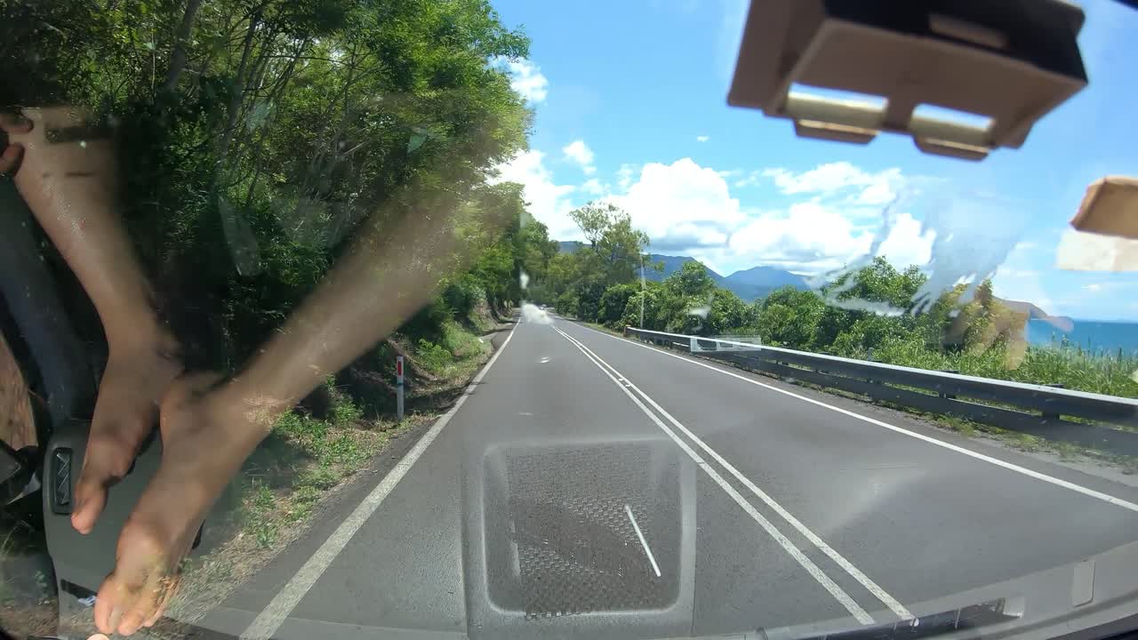 Coastal road scenic drive time lapse from van window. Beautiful serene Australian scenery