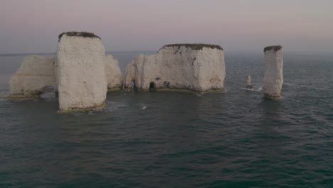 dramatic coastal cliffs at sunrise/sunset