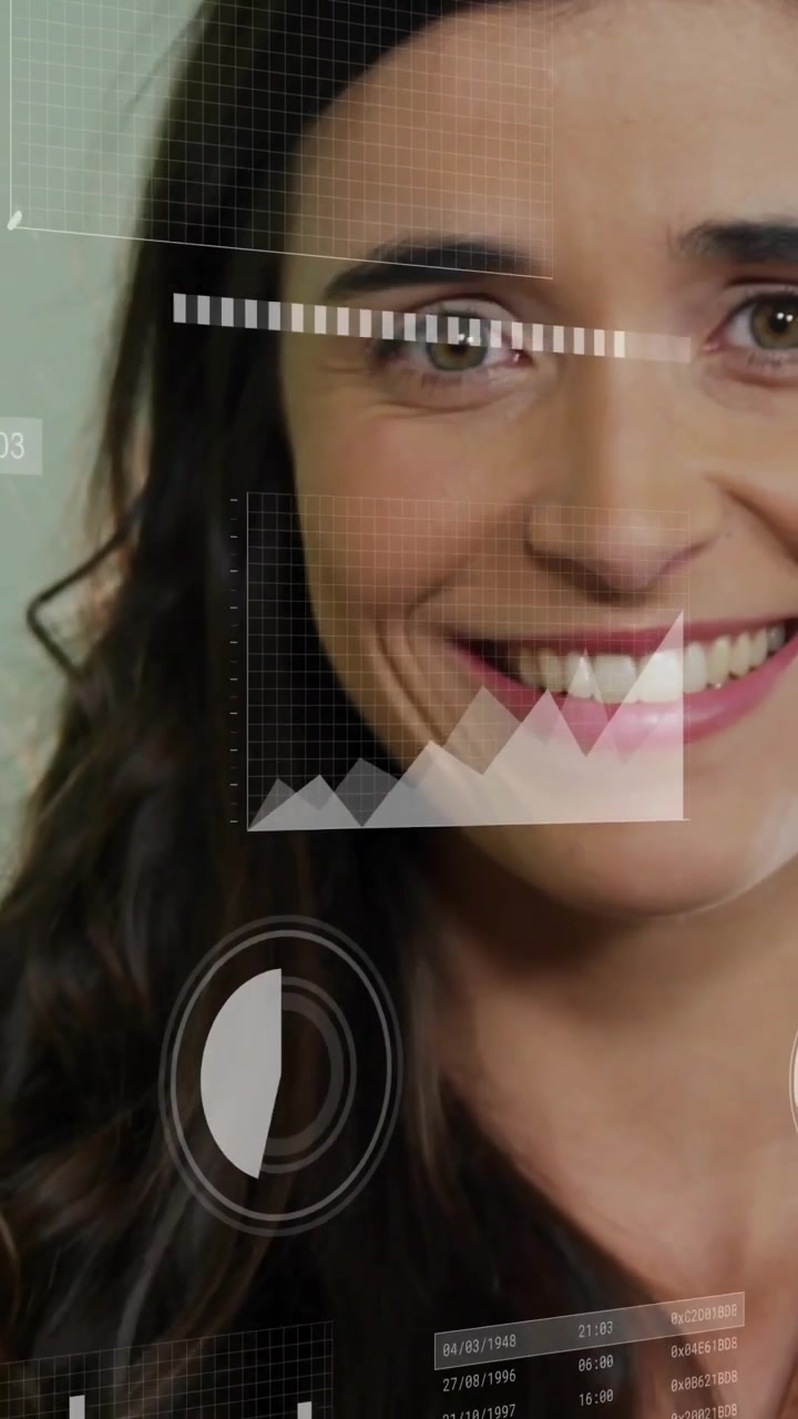 Vertical video: Woman reaching basket lifting green apple smiling at cam while data layering health