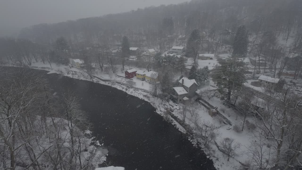 Rosendale, New York, on a snowy, beautiful winter day, during a nor'easter, as seen from the high trestle bridge, over the Rondout Creek, on the Wallkill Valley rail trail far above the village
