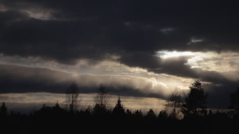 Heavenly-scene-with-golden-evening-clouds-and-silhouette-in-Vuokatti-Finland