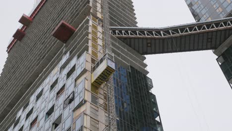 under construction building site of luxury condominiums in montreal, quebec canada