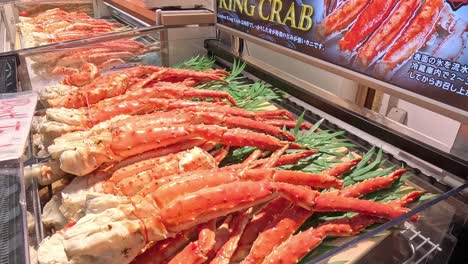 seafood display featuring king crab legs.