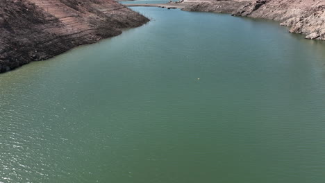 Drying-water-reservoir-in-Spain-during-drought-season,-aerial-view