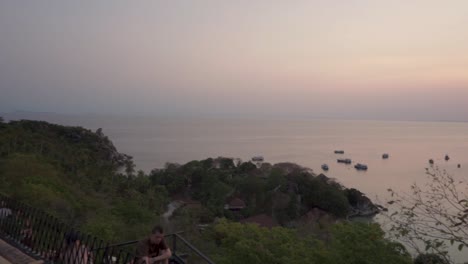 People-Enjoying-Sunset-from-Panoramic-Viewpoint-in-Ko-Tao,-Thailand