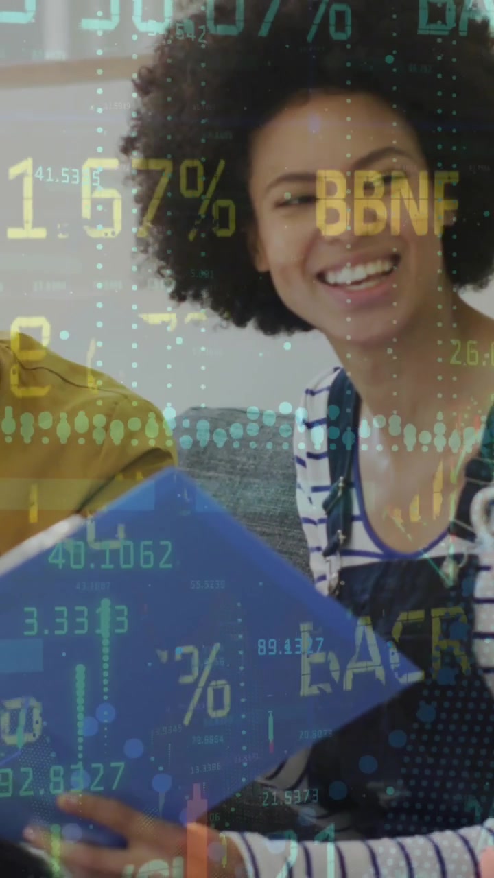 Animation of financial data and graphs over diverse female and male coworkers in office