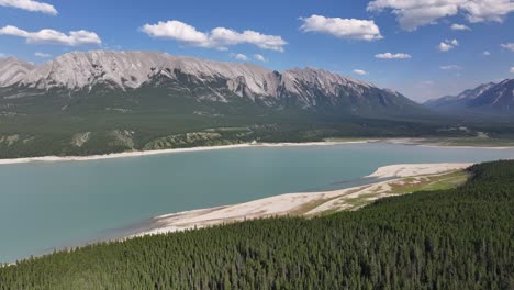 drone video of the western end of abraham lake and the rocky mountains of alberta, canada