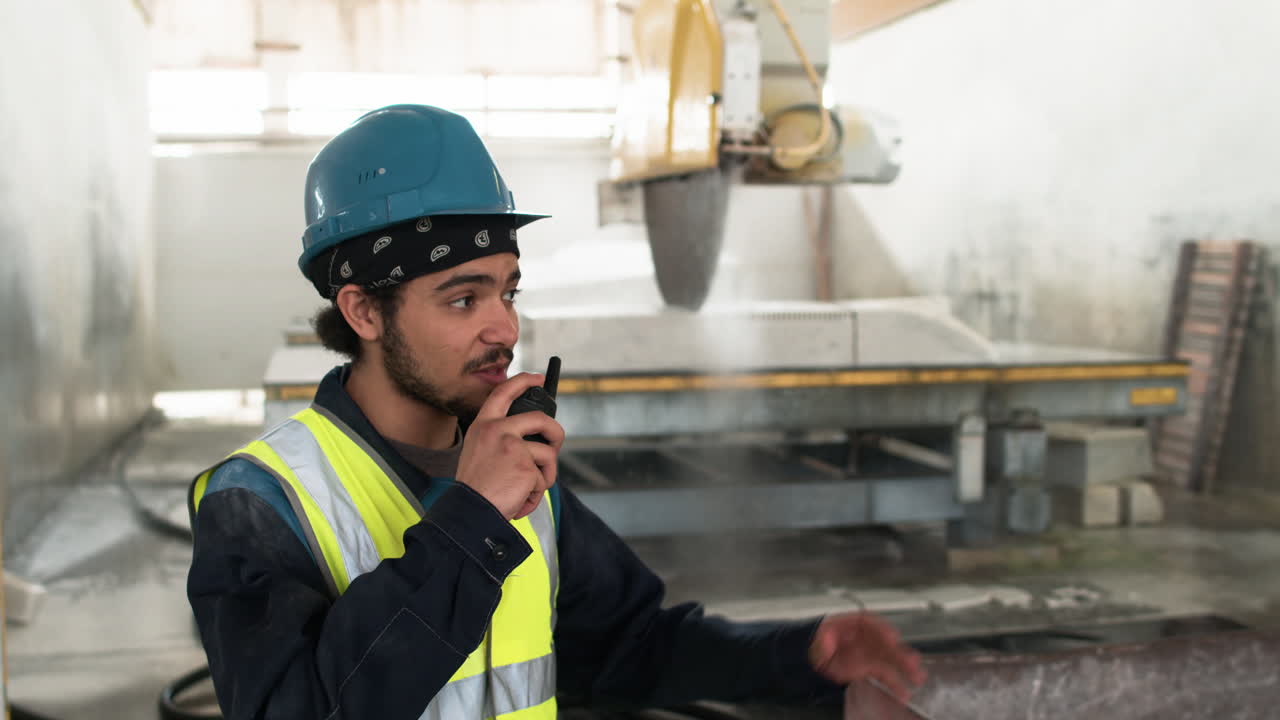 Man talking on walkie talkie