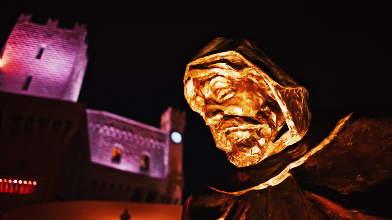 Monaco City, Monaco - October 4, 2024: Statue of Prince Francois Grimaldi with the Palace on the background in the evening
