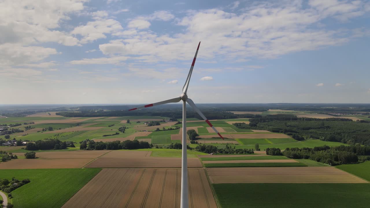 Drone flight fly in towards windmill