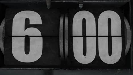High quality CGI render of an old style industrial looking flip clock ticking over from 5