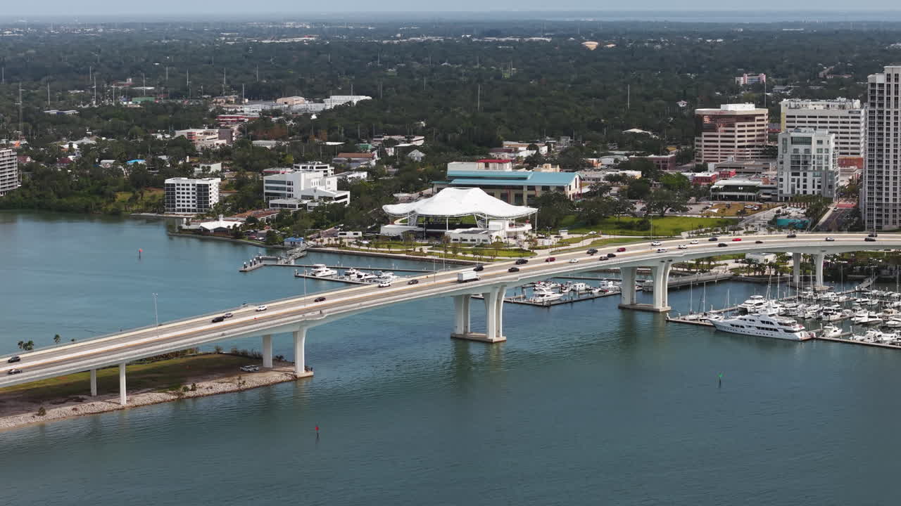 Aerial shot rising in front of the Causeway Byway bridge, in Clearwater, Florida