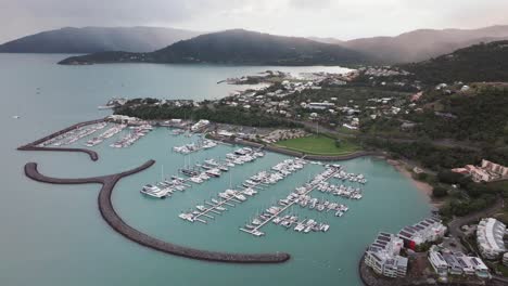 aerial view of a luxury marina and coastal town