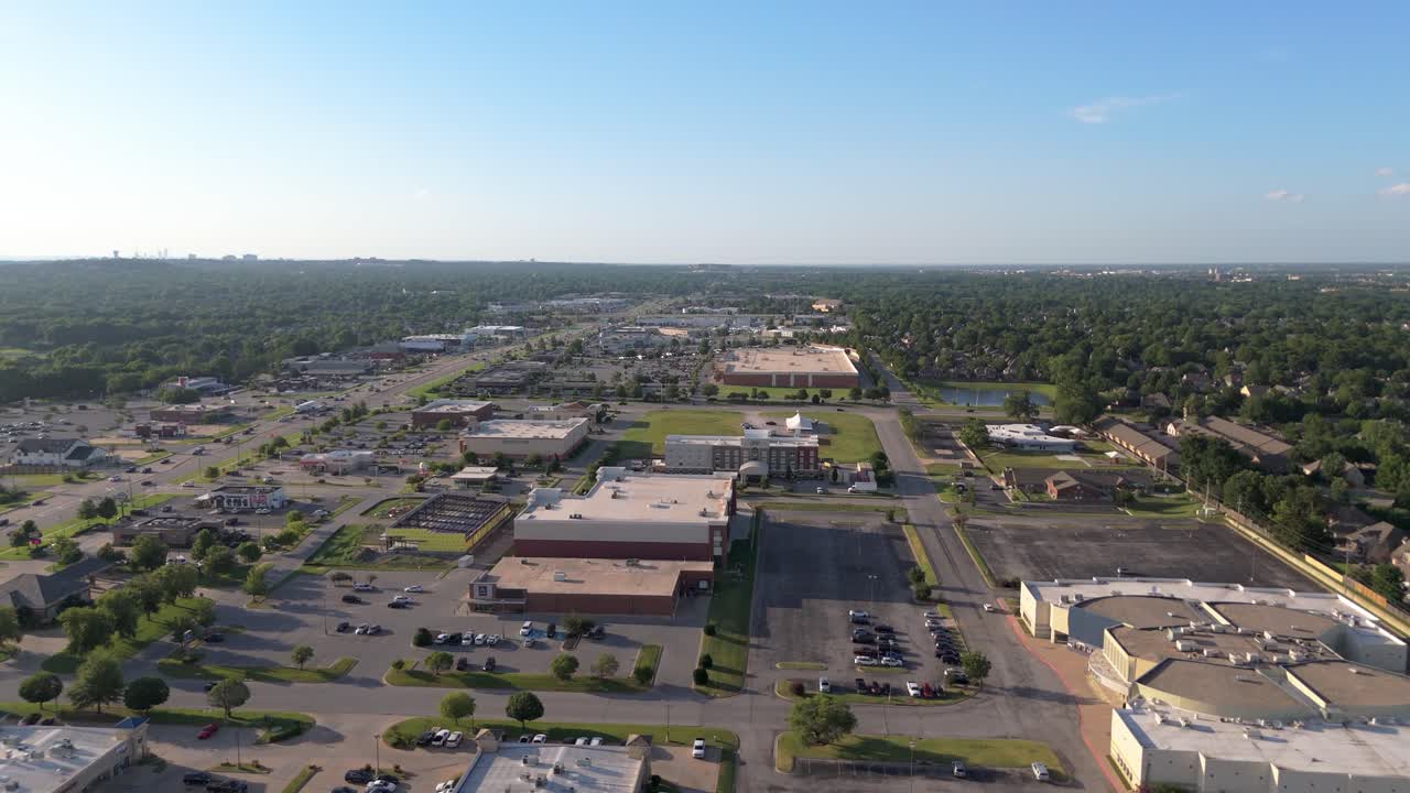Drone view over South Tulsa near South Memorial and E 101st—where big-box stores, leafy neighborhoods, and weekday buzz blend into a laid-back Oklahoma rhythm