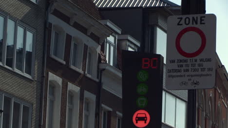 electronic warning traffic sign at a car-free street, fine of 58 euro for cars that pass