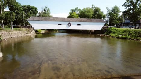 aerial push forward into the elizabethton covered bridge in elizabethton tennessee