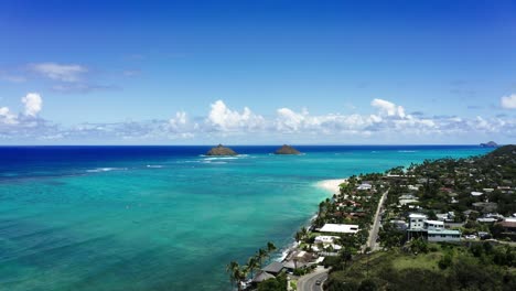 aerial view of hawaii's bright blue coastline in oahu