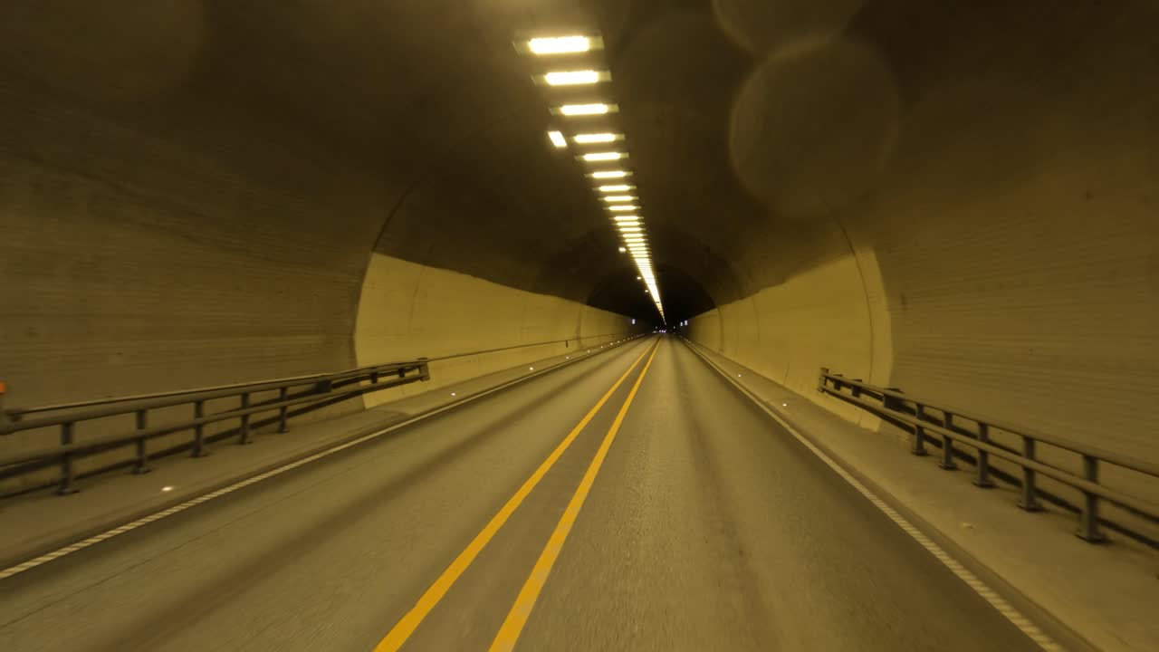 Car rides through the tunnel point-of-view driving in Norway.