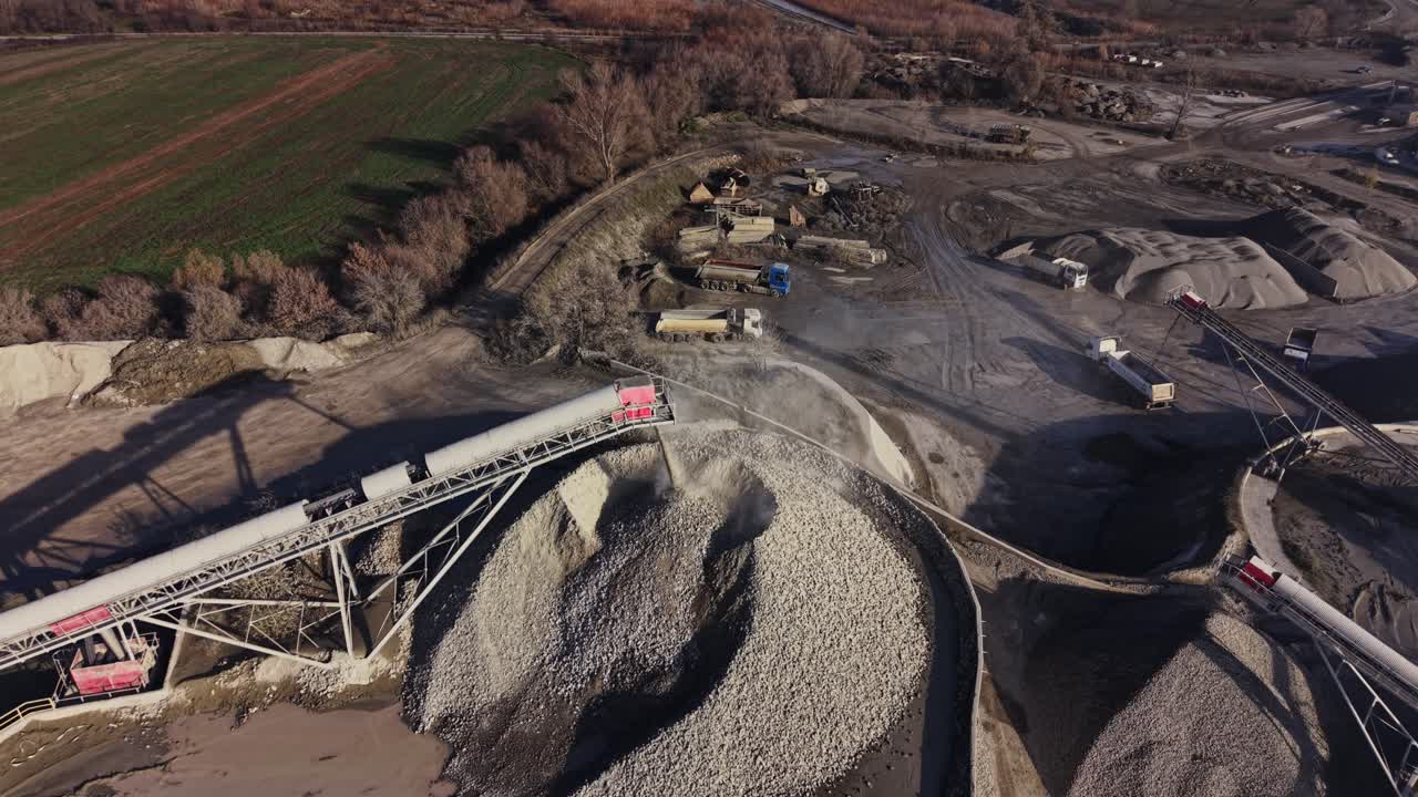 Large quarry site with machinery and materials for mining operations