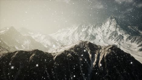heavy snowing, focused on the snowflakes, mountains in the background