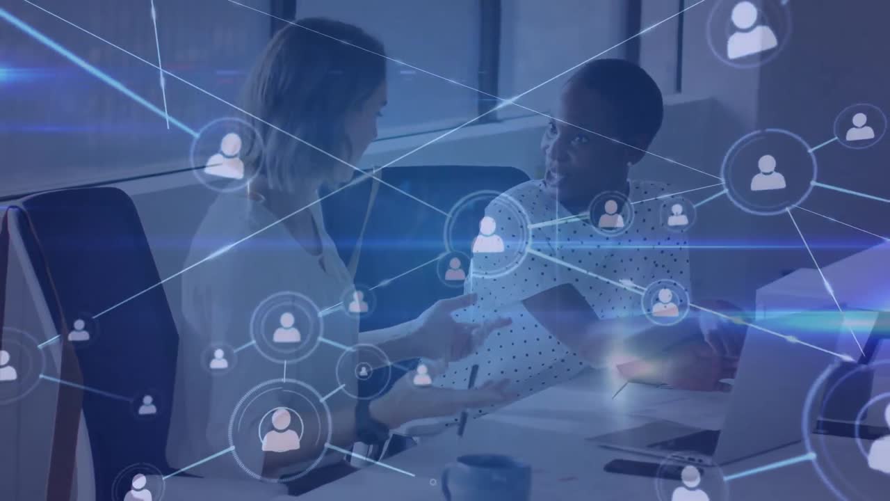 Animation of connections with digital icons over diverse businesswomen in office
