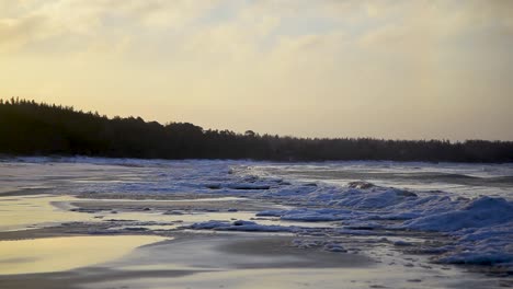 spectacular sunset light at winter seashore with ice