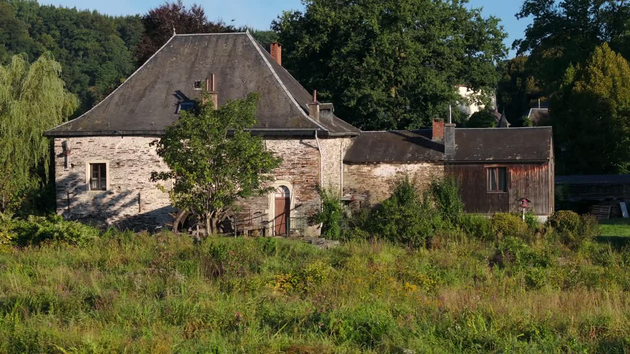 Old rural house in a natural landscape