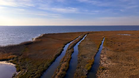 a low altitude, aerial view over a salt marsh on the south shore of long island, new york on a sunny day