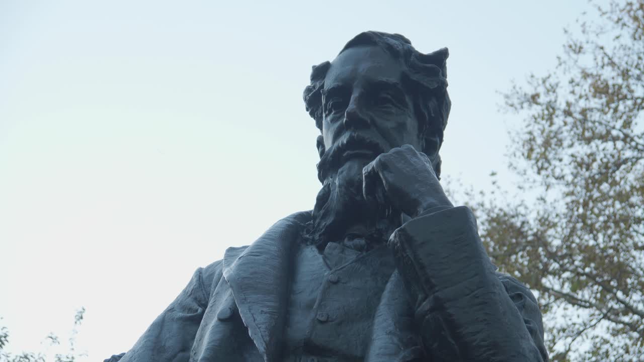 Bronze Statue of a Man in a Park