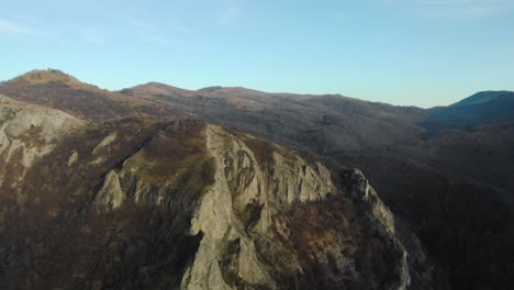 aerial shot of mountain hill with forest and cliffs-1