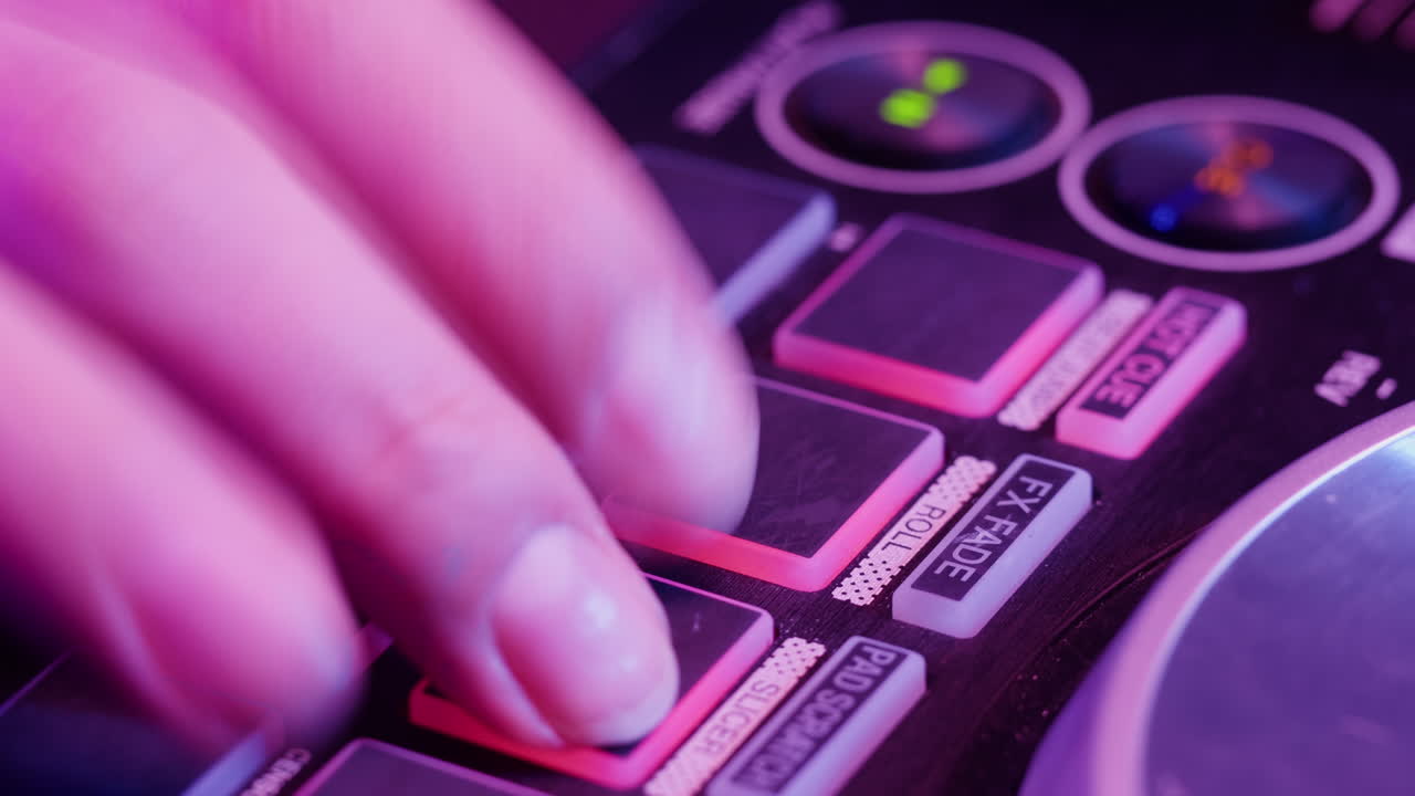 DJ with headphones and sunglasses playing music on festival in night club. Techno musician performing at nightclub for concert crowd of people, city bar.