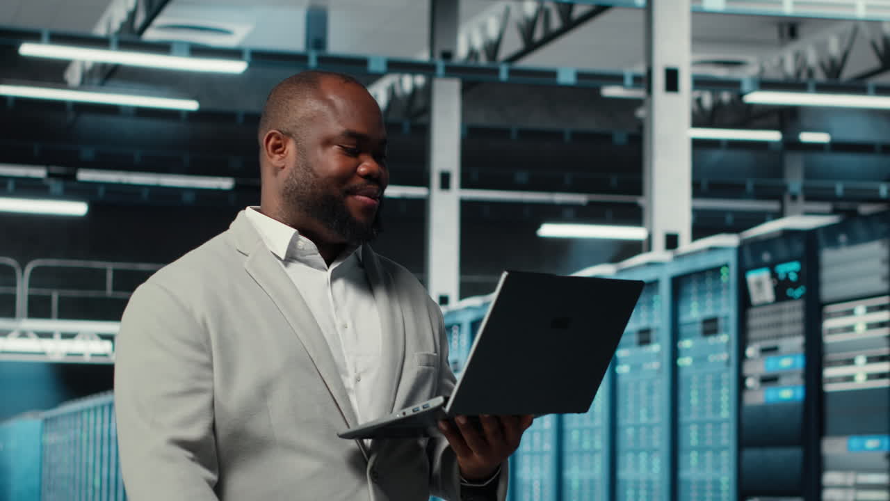 Vertical video Data center system administrator reviewing code for automation scripts