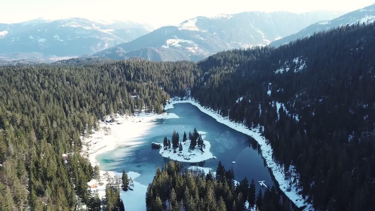 Aerial View of Frozen Mountain Lake in Winter