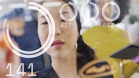 animation of data processing over asian businesswoman in office