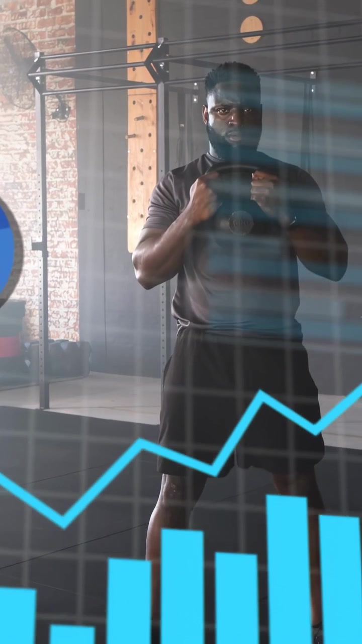 Vertical video: Man doing kettlebell goblet squats, overlay appearing and tracking fitness, charts