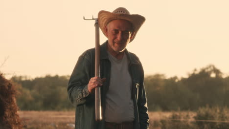 senior farmer at sunset