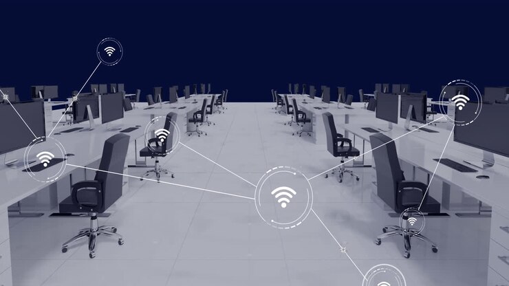 Animation of network of conncetions with icons over office interior with desks and computers