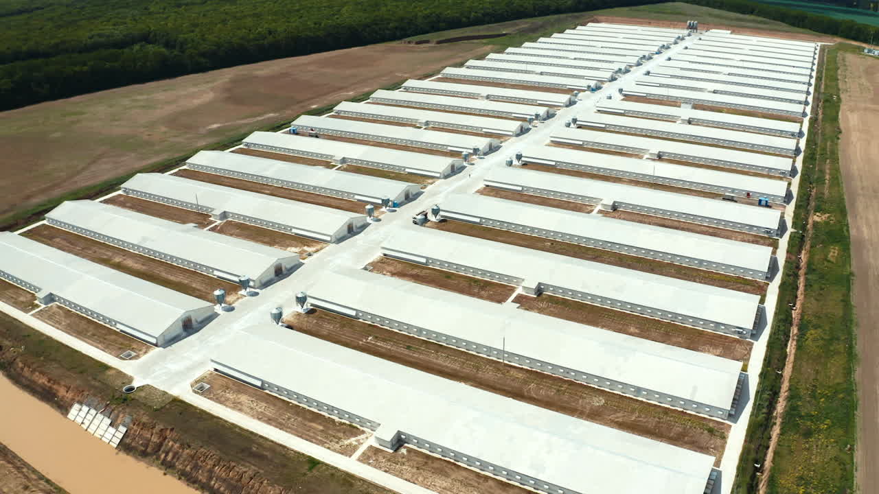 Poultry farm buildings. Aerial view of modern poultry facility in rural area