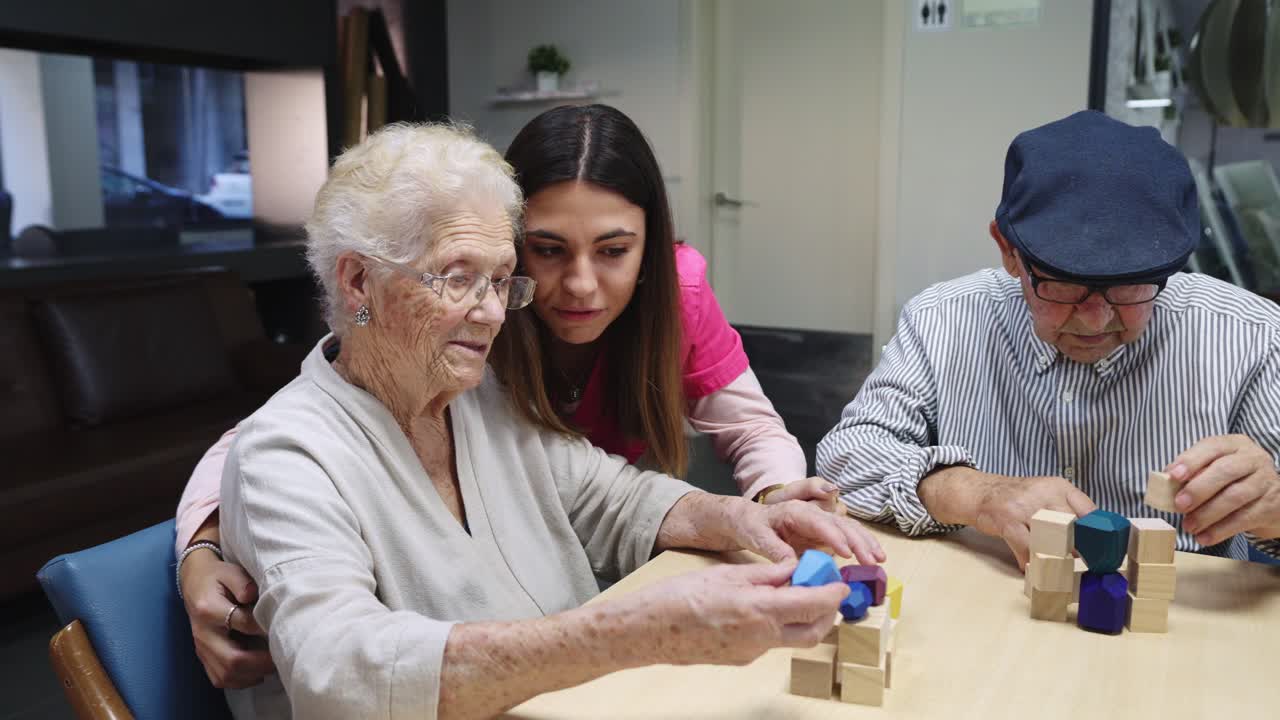 Elderly People Engaging with a Caregiver Using Wooden Blocks