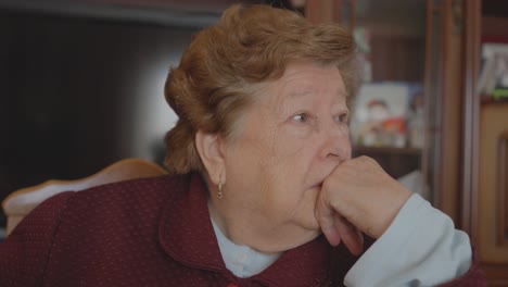 granny talking with someone about a problem on house roof